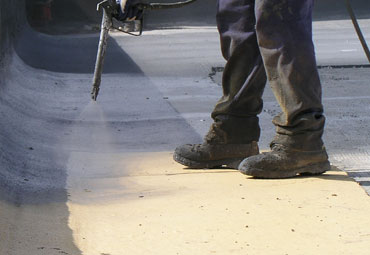 Coating systems over Tucson spray foam roof systems